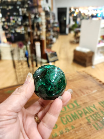 Transformative Beauty: Malachite Sphere